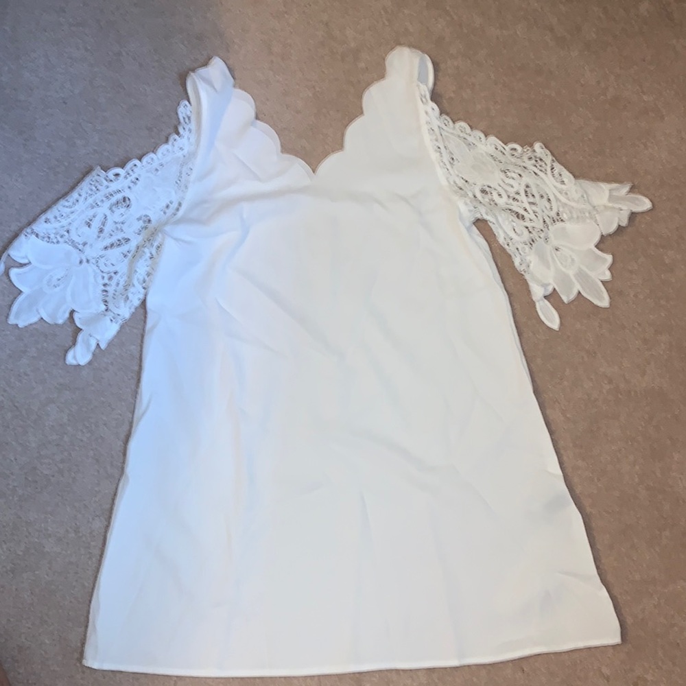 Never worn, white dress.